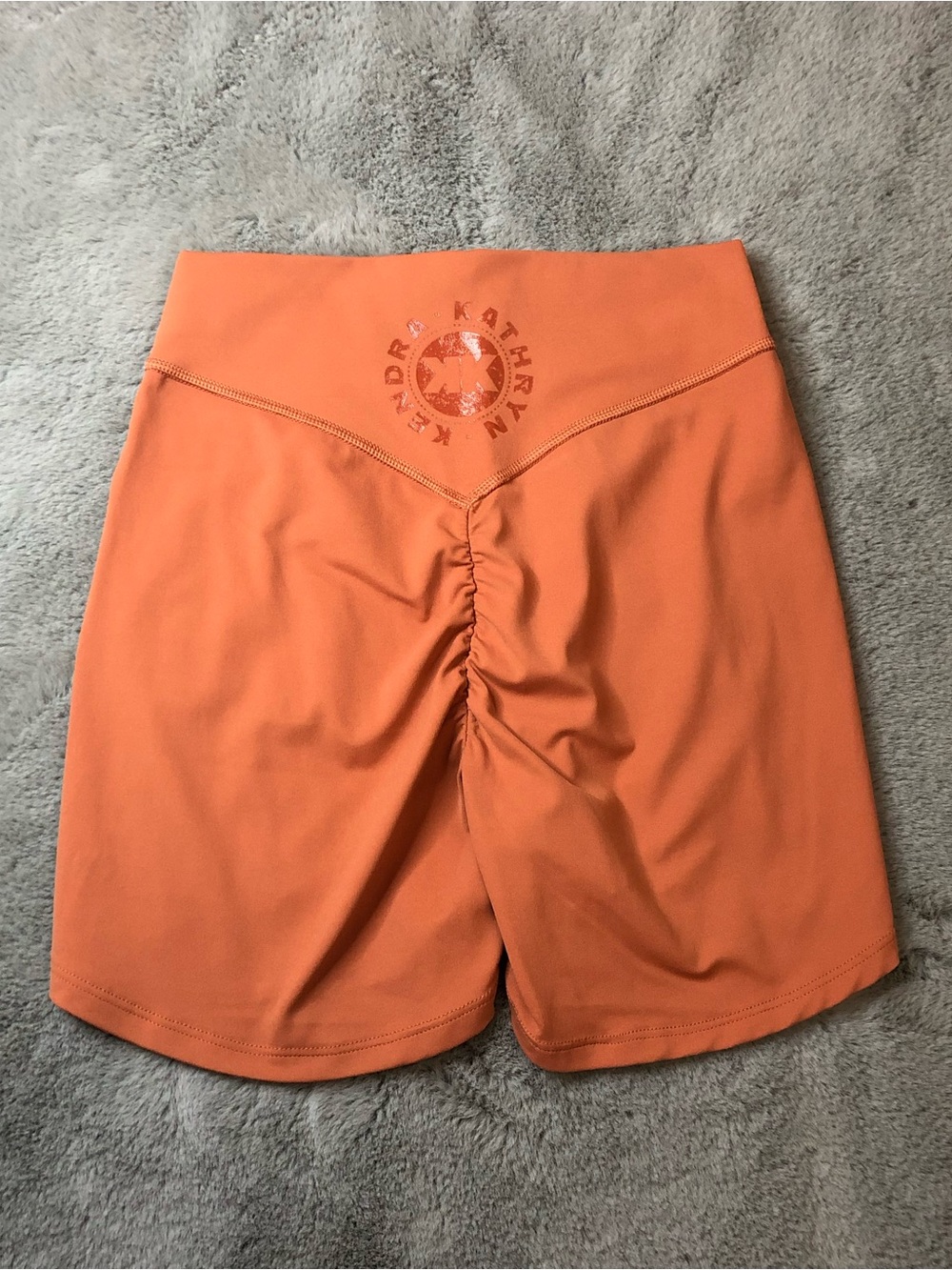 Gymshark KKFIT Orange High-Waist Ruched Bike Shorts